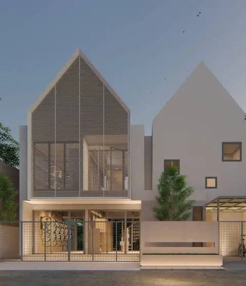Fasad rumah dua lantai dengan atap pelana kembar dan kisi kayu
