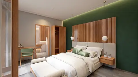 Kamar tidur dengan dinding hijau tua dan headboard panel kayu