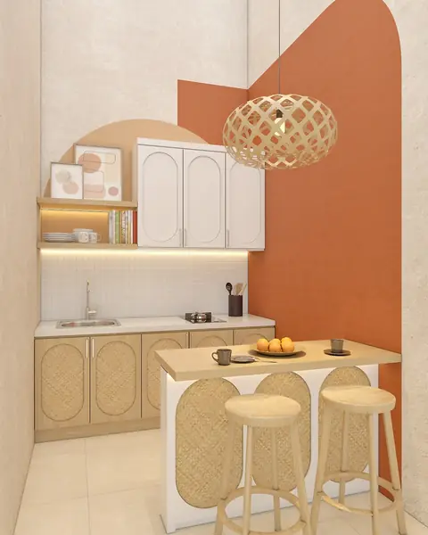 Pantry kecil dengan meja bar, dua bangku rotan, dan dinding oranye